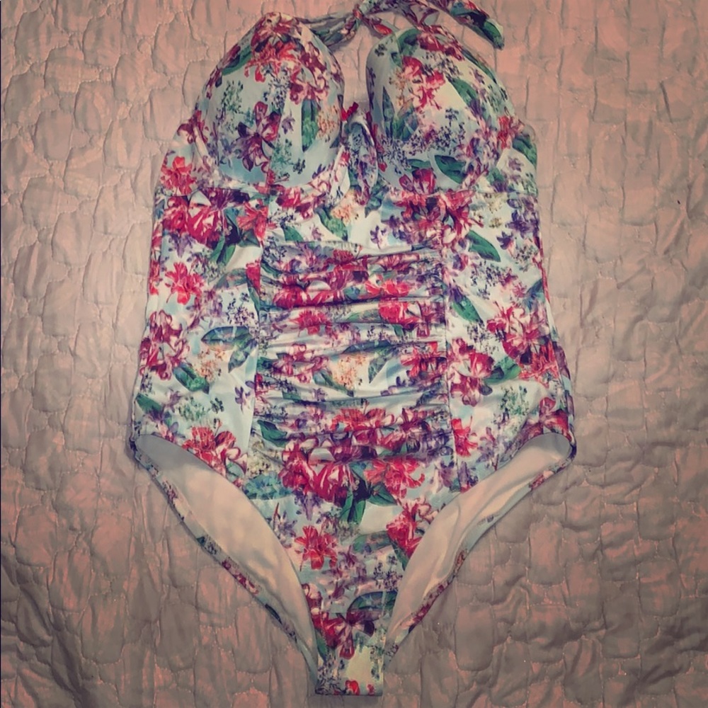 Turquoise one piece bathing suit with flowers